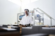 © Yakobchuk Olena - Pleased male worker examining the food packaging
