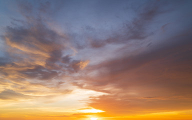 Wall Mural - abstract amazing scene of stuning colorful sunset with clouds background in nature and travel concep
