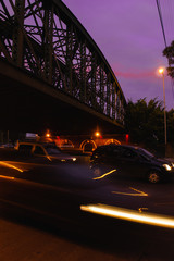 Poster - Beautiful vertical long exposure photo of a highway during evening