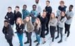 © ASDF - group of diverse young people looking at the camera