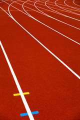 Red stadium running track closeup