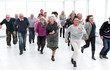 © ASDF - a group of retirees are running for retirement. group of older p