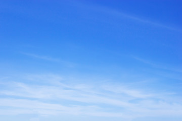 Wall Mural - blue sky background and white clouds soft focus, and copy space