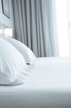 Pillows With White Covers On Luxury Hotel King Size Bed