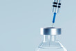 Corona virus vaccine development with syringe and ampoule - 3D illustration