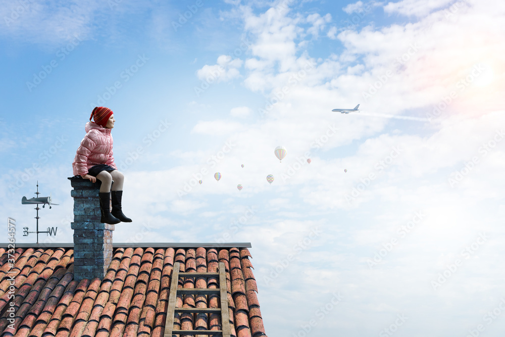 Dreamy little girl sitting alone Stock Photo | Adobe Stock