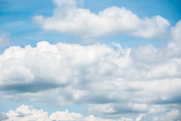 Wall Mural - blue sky background with white clouds