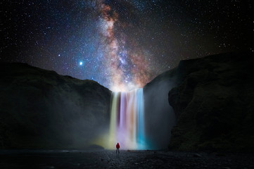 colorful waterfall with milky way
