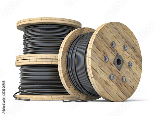 Fotografía Wire electric cable on wooden coil or spool isolated on white background