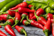 Group of Red hot chilli peppers close-up on a dark backgroundм