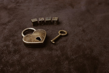 Wall Mural - Love shaped padlock, key and love wording