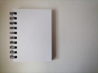 open notebook with blank pages