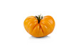 Large yellow tomato in the shape of heart isolated