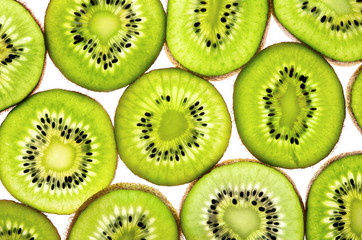 Wall Mural - slices of kiwi fruit isolated as background