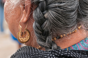 Lady with gold earring;  Mitla;  Mexico
