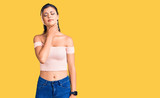 Fototapeta Panele - Young beautiful woman wearing casual clothes touching painful neck, sore throat for flu, clod and infection