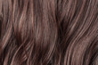 Single piece clip in wavy dark brown synthetic hair extensions