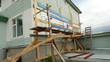 © Владислав Вольхин - the two-storey house is surrounded by scaffolding