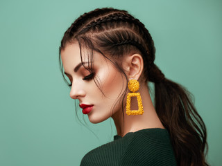 Wall Mural - brunette girl with perfect makeup. beautiful model woman with curly hairstyle. care and beauty hair 