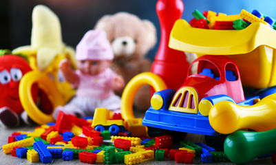 Colorful plastic and plush toys in a children's room