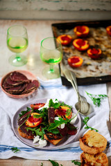 Canvas Print - Grilled peaches, goat cheese, and bresaola salad..