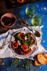 Canvas Print - Grilled peaches, goat cheese, and bresaola salad..