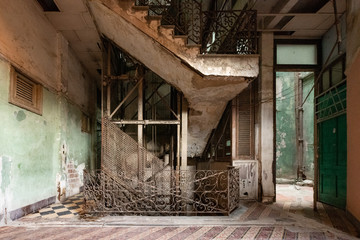 A badly damaged stairwell in Havana Cuba.