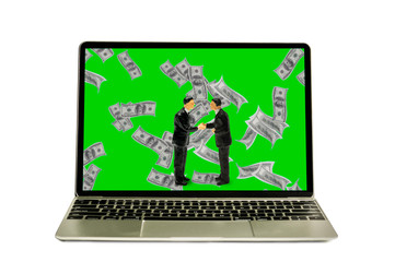 Miniature business partner stand among falling money do hand check project successful online business, modern laptop with mock up green screen.