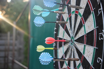 Darts target closeup. Success hitting target aim goal achievement concept