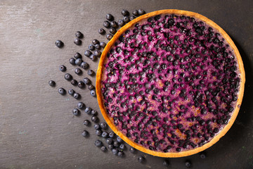 Wall Mural - blueberry pie and fresh berries, top view