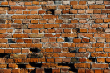 Closeup Of An Old Reddish Brick Wall Background.