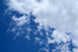 blue sky background with white clouds across