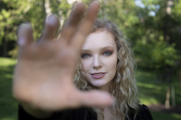 Poster - Selective focus shot of a young attractive female posing at camera