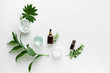 Natural cosmetics and green leaves