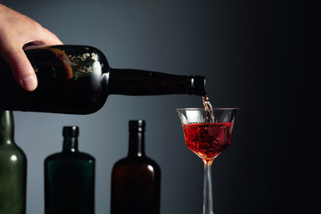 Wall Mural - Aged golden fortified sherry being poured into a crystal glass.