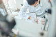 © Viacheslav Yakobchuk - Male scientist working with a test specimen