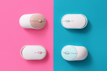 Modern PC Mouse Devices On Color Background