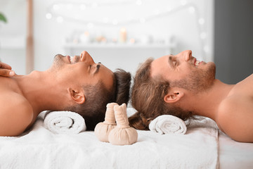 Wall Mural - Happy gay couple relaxing in spa salon