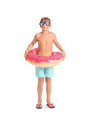 Wall Mural - Cute little boy with inflatable ring on white background