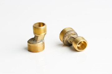 Metal brass water pipe fittings. Materials for plumbing works.