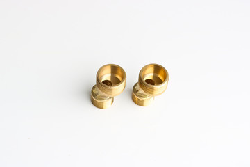 Metal brass water pipe fittings. Materials for plumbing works.