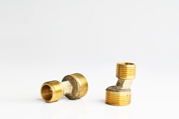 Metal brass water pipe fittings. Materials for plumbing works.