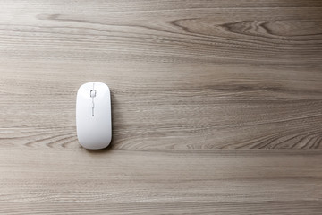 Top veiw of White computer mouse on desk