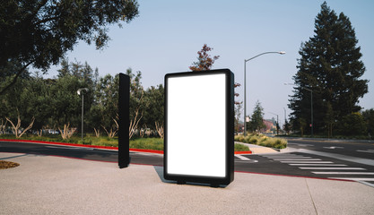 Wall Mural - Street billboard with blank copy space screen for advertising text message or promotional content, empty mock up Lightbox for information, modern clear board poster display in public urban city street