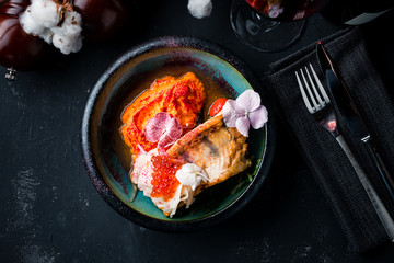 Canvas Print - white fish baked served in the restaurant