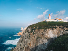 Portugal Lighthouse With Cliff And Sea