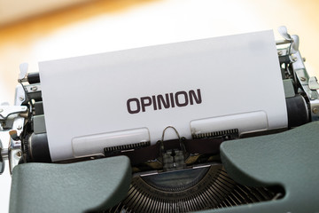 Opinion written on a paper in a typewriter