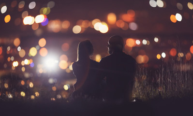 Romantic Lovers couple against background night city, sky star. Concept romance date Valentine Day, first kiss love