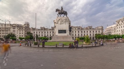 Canvas Print - Monument to Jose de San Martin on the Plaza San Martin timelapse hyperlapse in Lima, Peru. Cloudy sky and historic buildings on a background