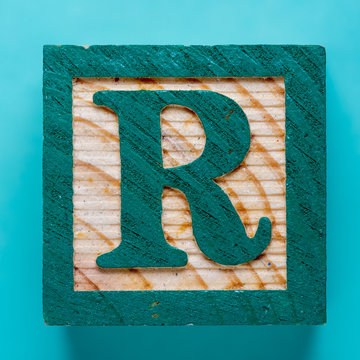 Wall Mural - Wooden cube with letter R